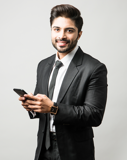 indian-business-man-using-cell-phone-having-conversation-typing-sms-presenting 1